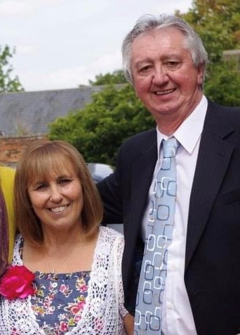 Older couple in smart clothes